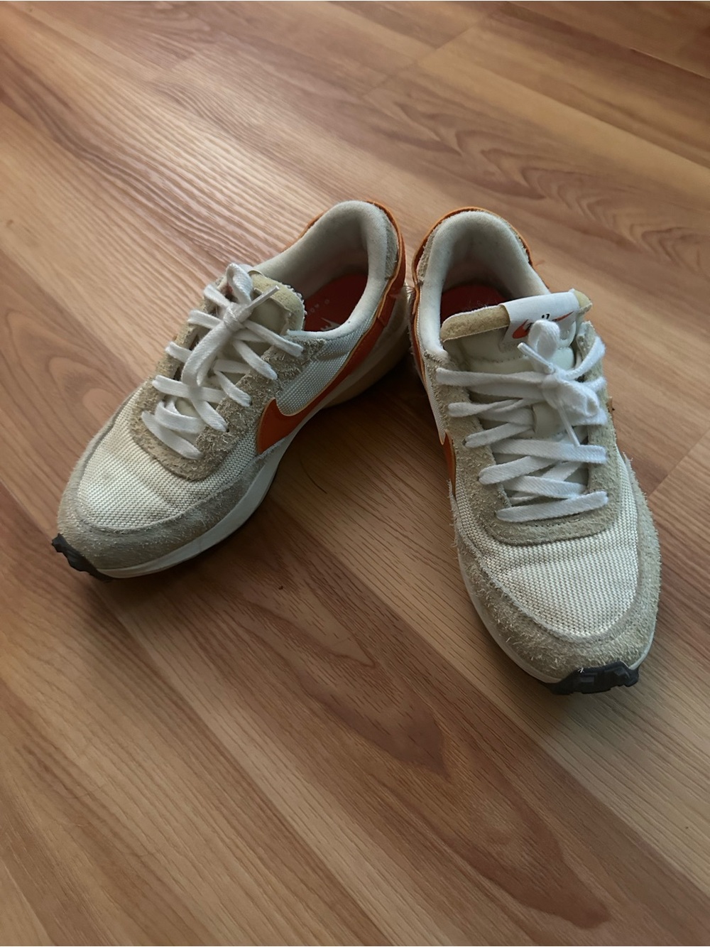 Nike women’s Cream and Orange Retro Running Sneakers
